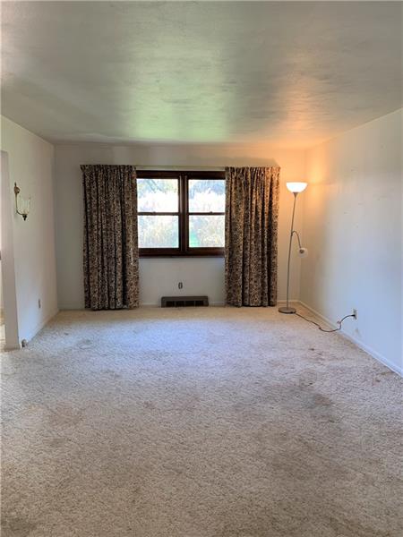 110 Thorne Road Washington, PA 15301 - Photo 12 of 25 Large living room measures 12x22.