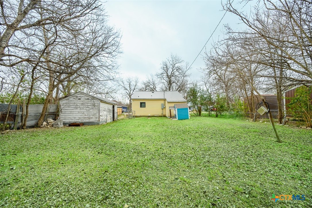 1010 South 4th Street Temple, TX 76504 - Photo 17 of 19 a view of a house with a back yard