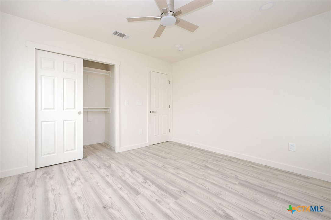 1010 South 4th Street Temple, TX 76504 - Photo 10 of 19 wooden floor in an empty room