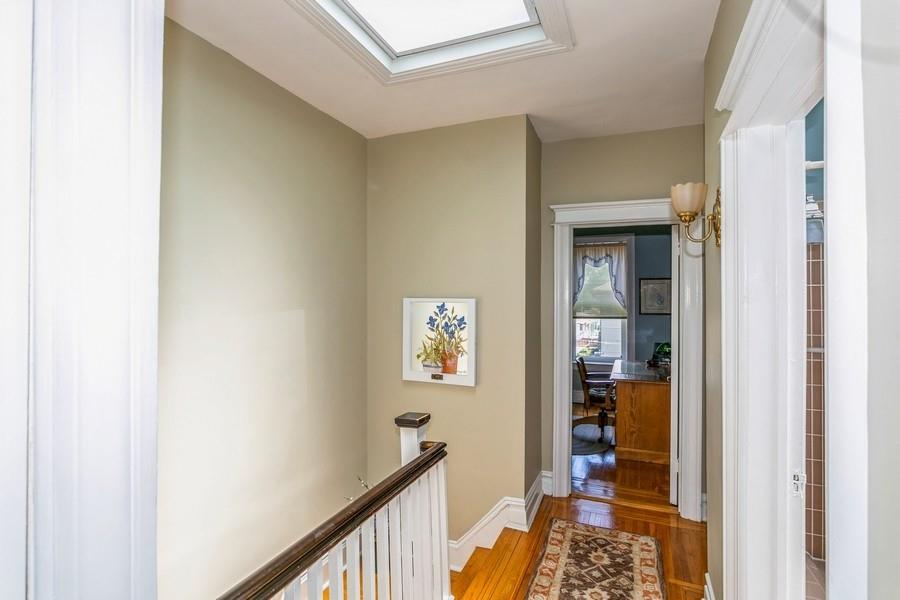 8917 Ridge Boulevard Brooklyn, NY 11209 - Photo 12 of 24 a view of a hallway with windows and closet