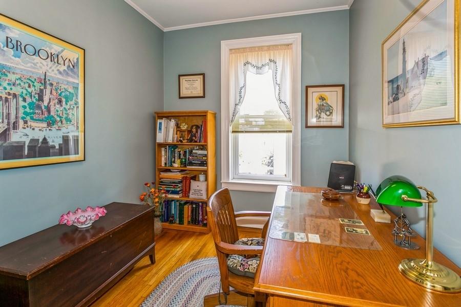8917 Ridge Boulevard Brooklyn, NY 11209 - Photo 16 of 24 a living room with furniture and a window