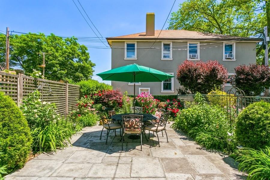 8917 Ridge Boulevard Brooklyn, NY 11209 - Photo 20 of 24 a view of a chair and table under an umbrella in the patio