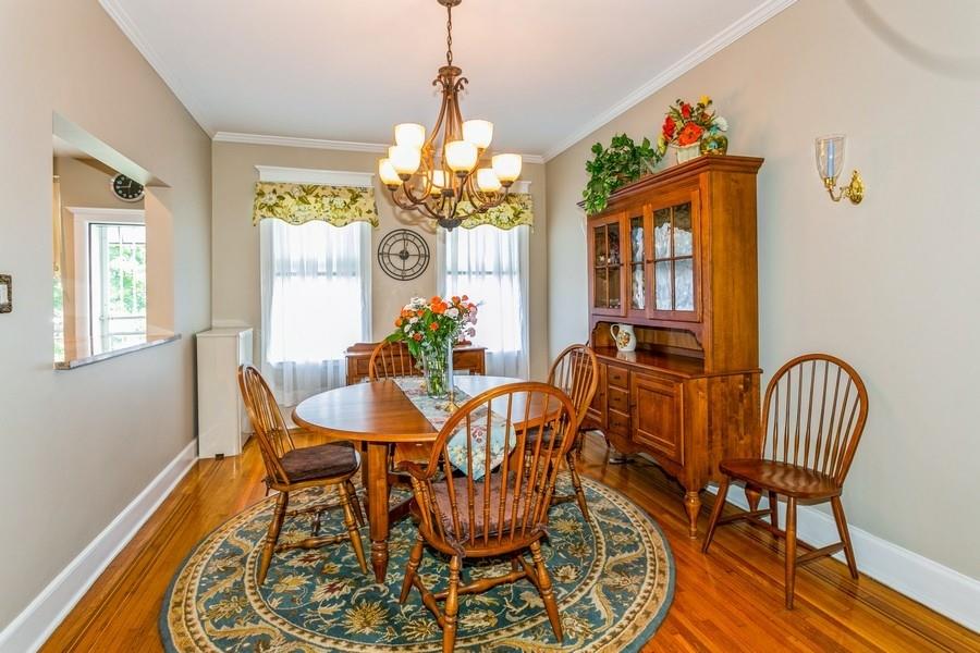 8917 Ridge Boulevard Brooklyn, NY 11209 - Photo 7 of 24 a view of a dining room with furniture and a chandelier