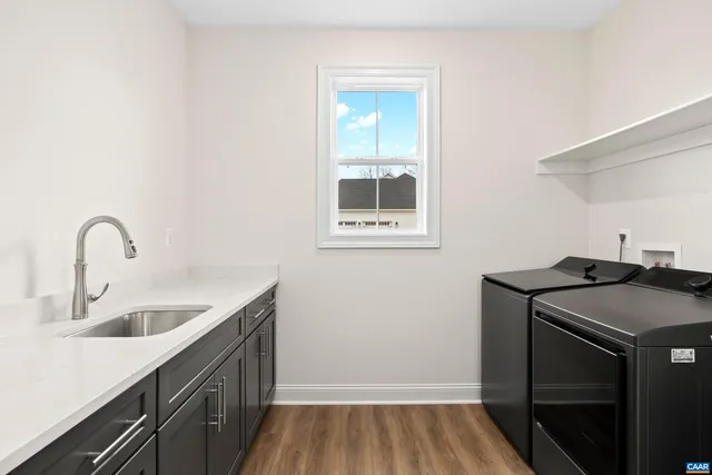 a view of a hallway with wooden shelves