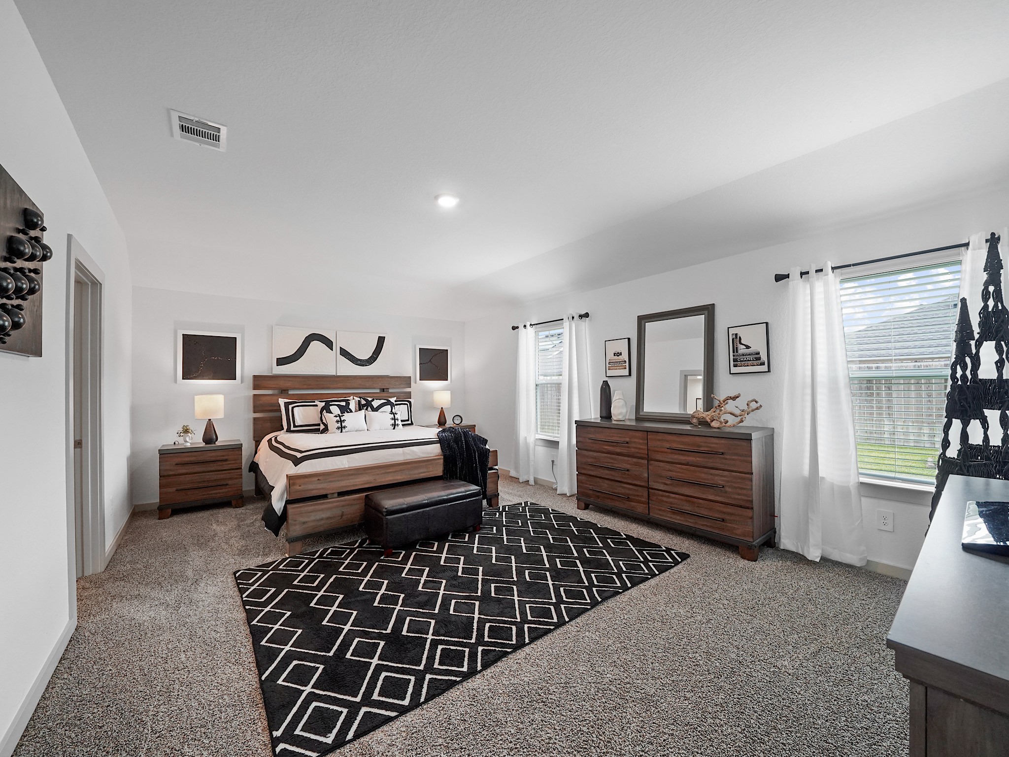 7823 Cattlewood Pass Rosharon, TX 77583 - Photo 12 of 17 Primary Bedroom is fantastic and has ample natural light from two windows.
