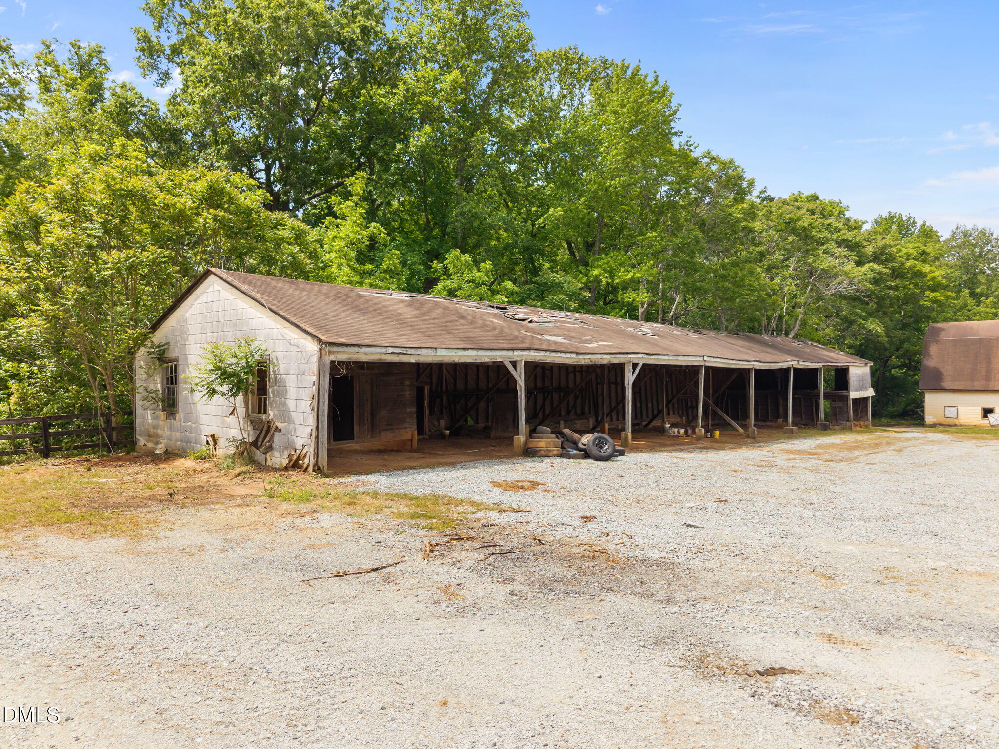 423 Quail Roost Farm Road Rougemont, NC 27572 - Photo 25 of 44 a view of a house with a yard