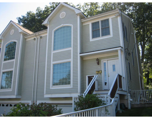 60 Tanglewood Road, Unit 60 Newton, MA 02459 - Photo 1 of 11 front view of house