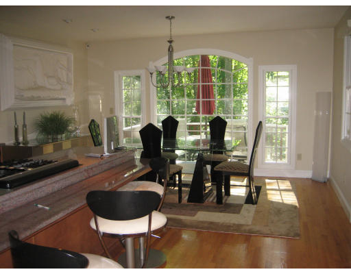 60 Tanglewood Road, Unit 60 Newton, MA 02459 - Photo 5 of 11 a dining room with furniture and wooden floor