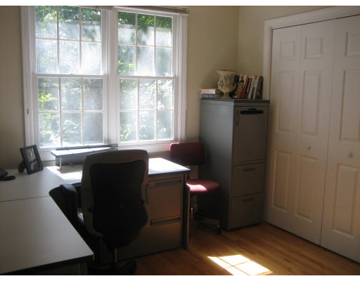 60 Tanglewood Road, Unit 60 Newton, MA 02459 - Photo 7 of 11 a view of a workspace with furniture and a window