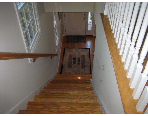60 Tanglewood Road, Unit 60 Newton, MA 02459 - Photo 9 of 11 a view of entryway and kitchen