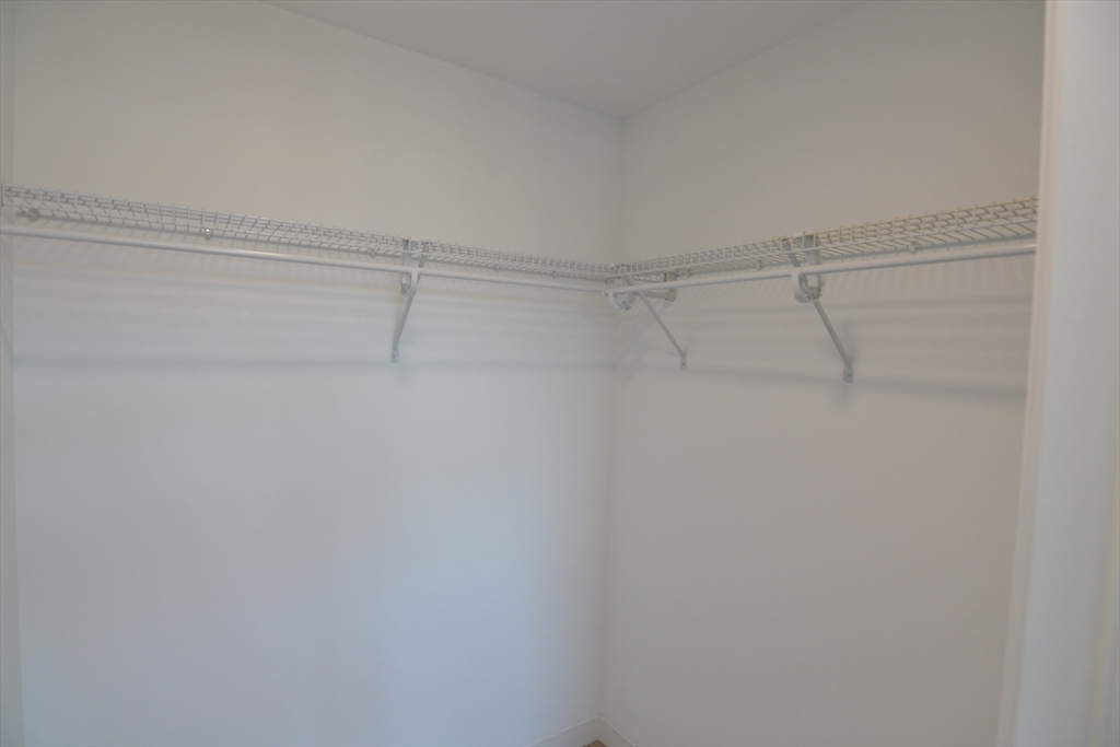 1282 Boylston Street, Unit 511 Boston, MA 02215 - Photo 17 of 18 a view of a room with racks on the wall