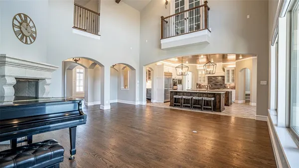 a view of an entryway with wooden floor