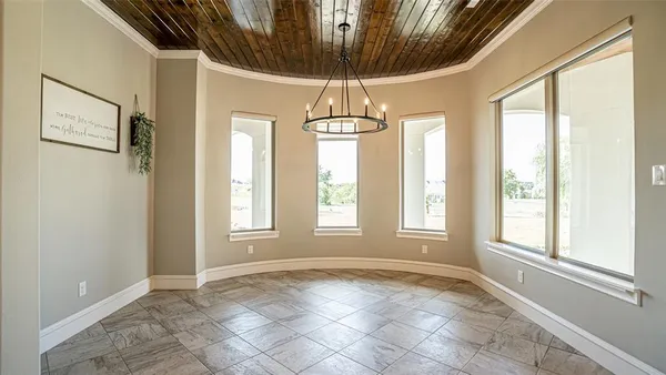 a view of an empty room and window