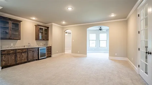 a large kitchen with a large window