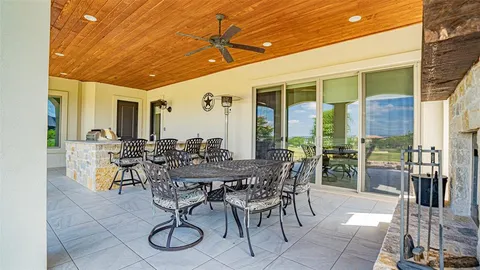 a view of a playground with a patio