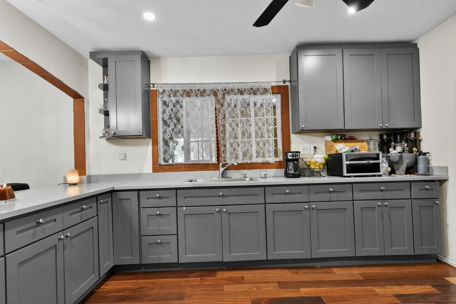 5263 Chile Camp Road Campo Seco X, CA 95226 - Photo 8 of 24 a kitchen with a sink cabinets and window