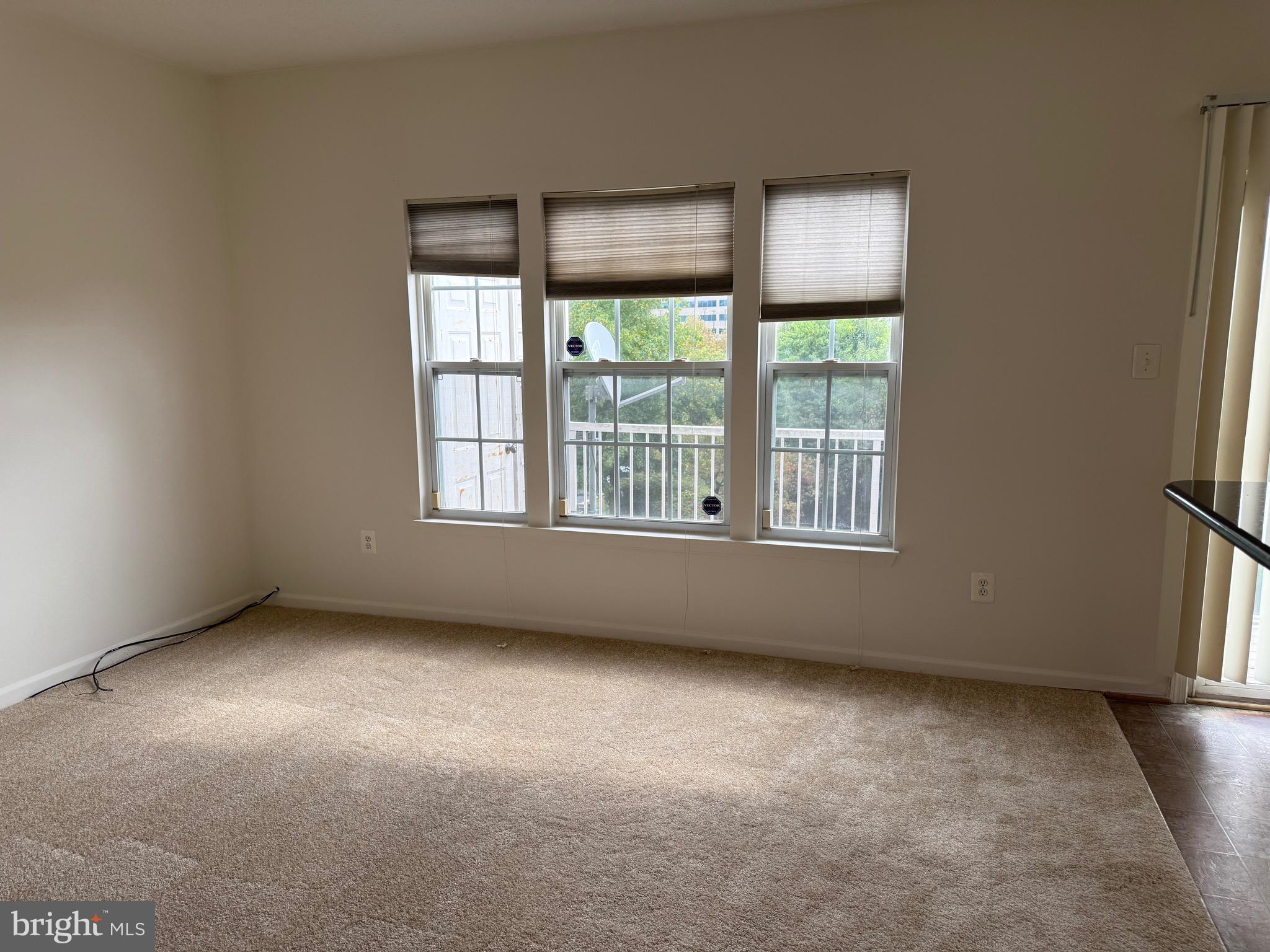 11039 Mill Centre Drive, Unit 11039 Owings Mills, MD 21117 - Photo 15 of 33 an empty room with windows