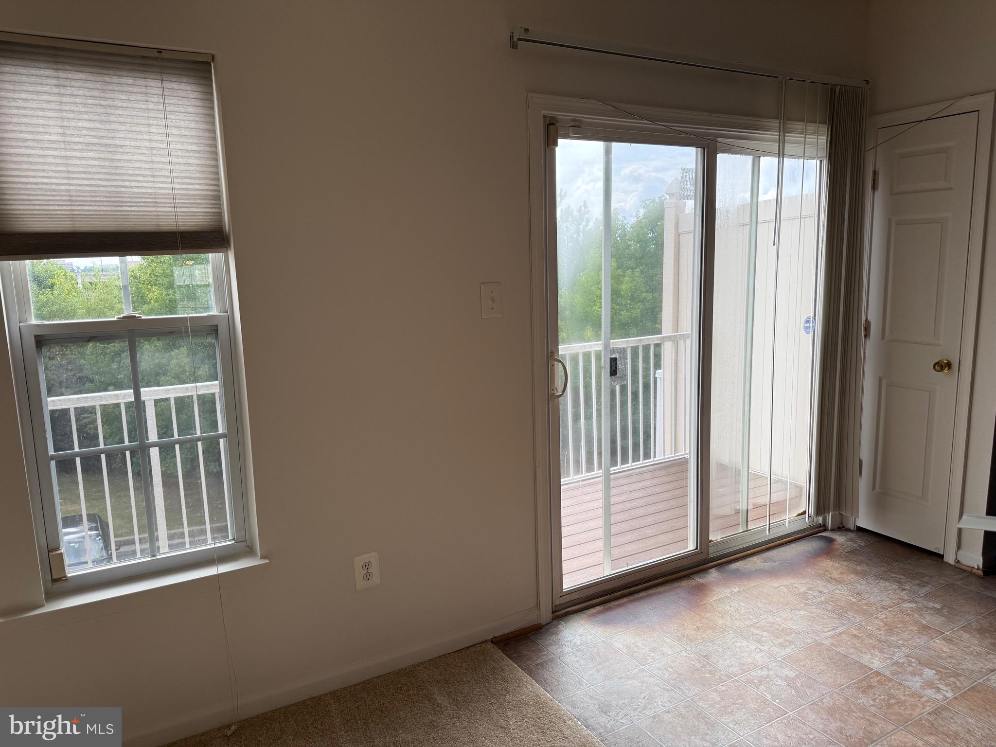 11039 Mill Centre Drive, Unit 11039 Owings Mills, MD 21117 - Photo 16 of 33 a view of empty room with windows