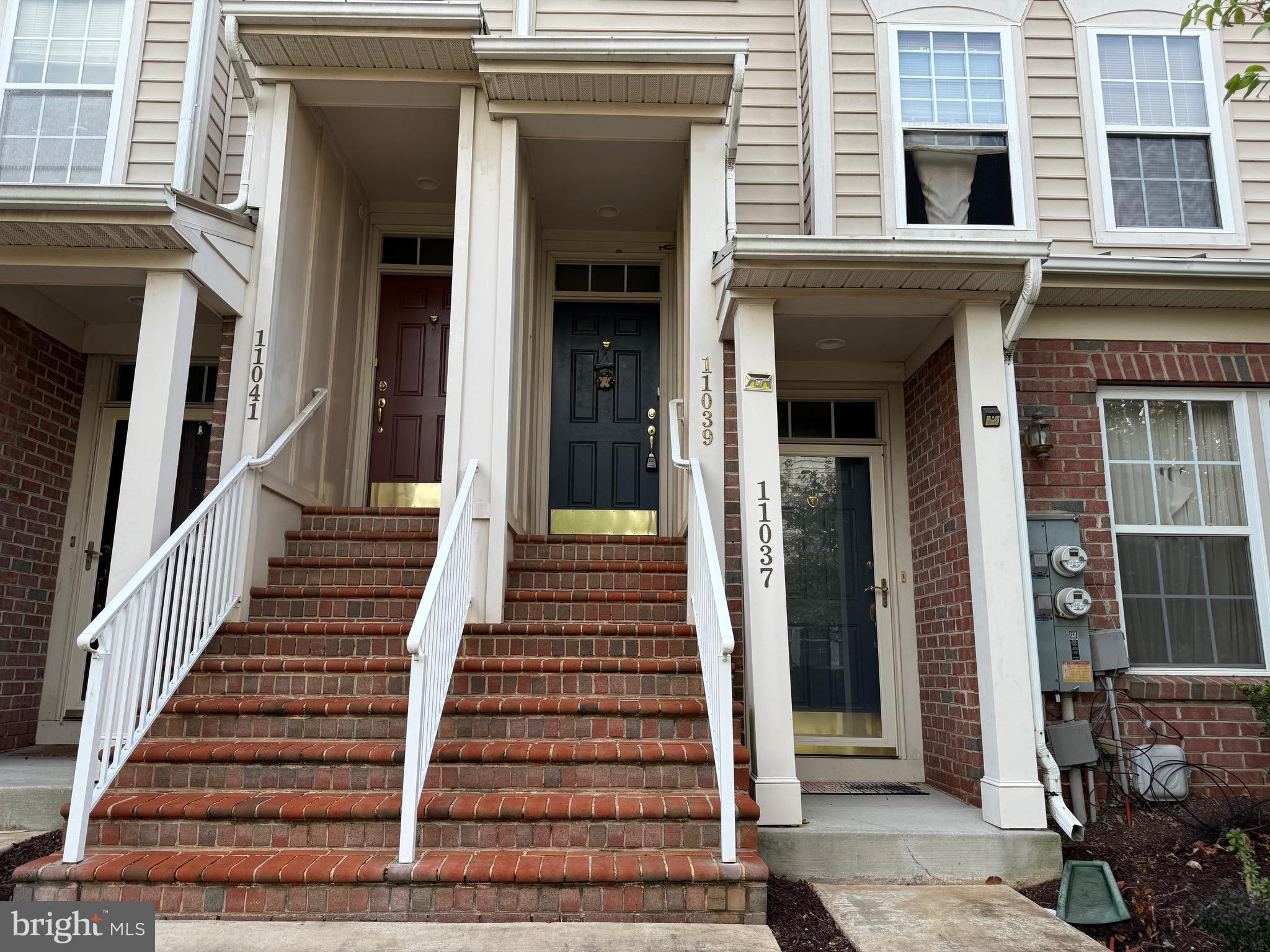 11039 Mill Centre Drive, Unit 11039 Owings Mills, MD 21117 - Photo 3 of 33 a view of a entryway door of the house