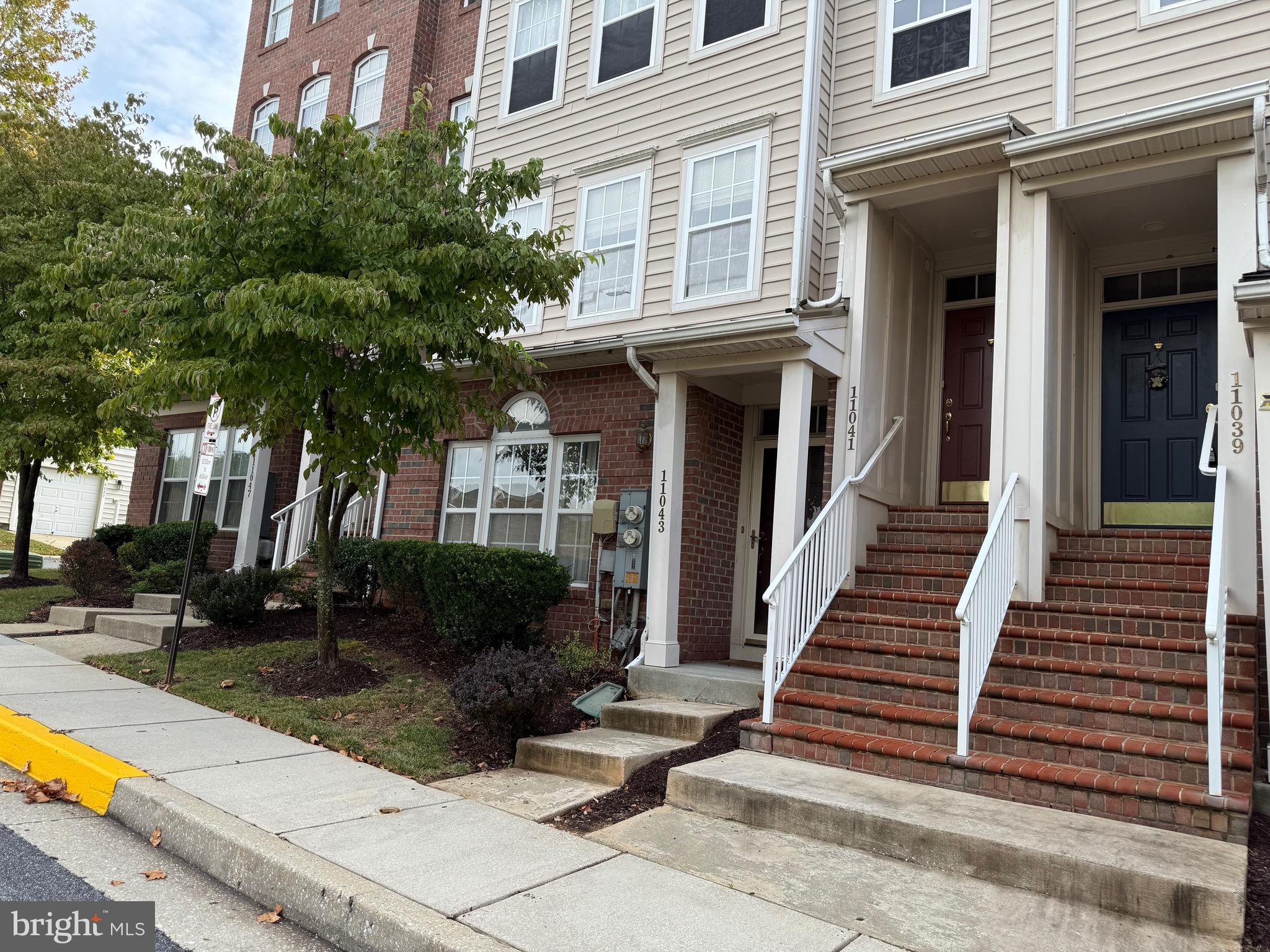11039 Mill Centre Drive, Unit 11039 Owings Mills, MD 21117 - Photo 4 of 33 a view of a house with entertaining space