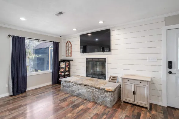 a view of a lake in middle of a town