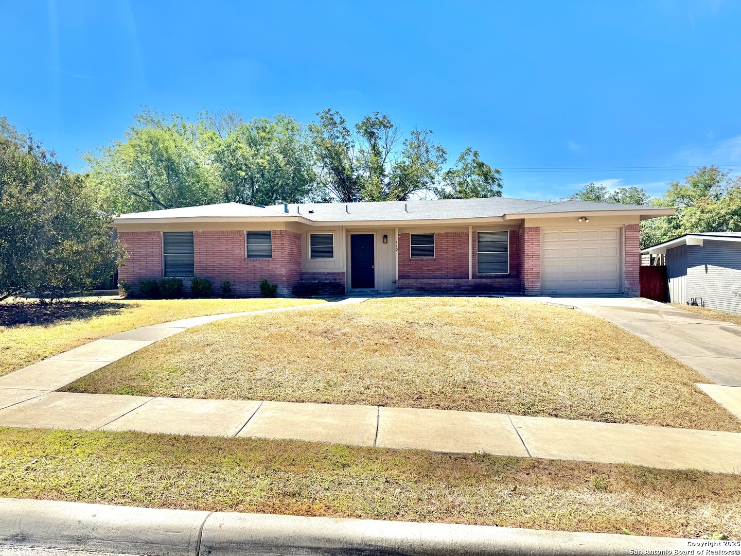 a view of swimming pool with a yard