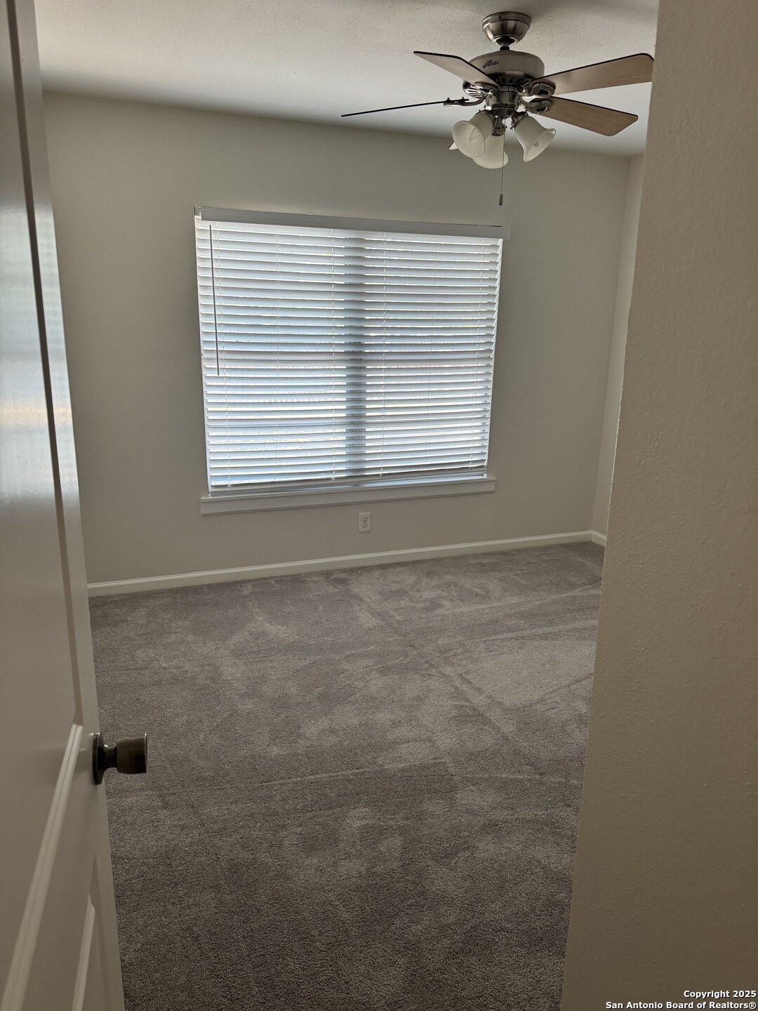410 Shannon Lee Street San Antonio, TX 78216 - Photo 16 of 19 a view of a closet in a room