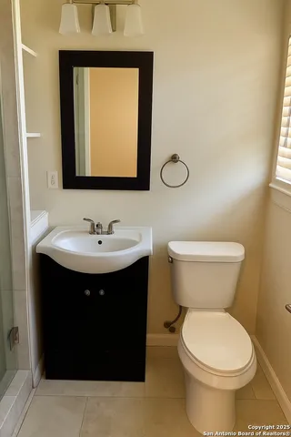 a bathroom with a sink and a toilet