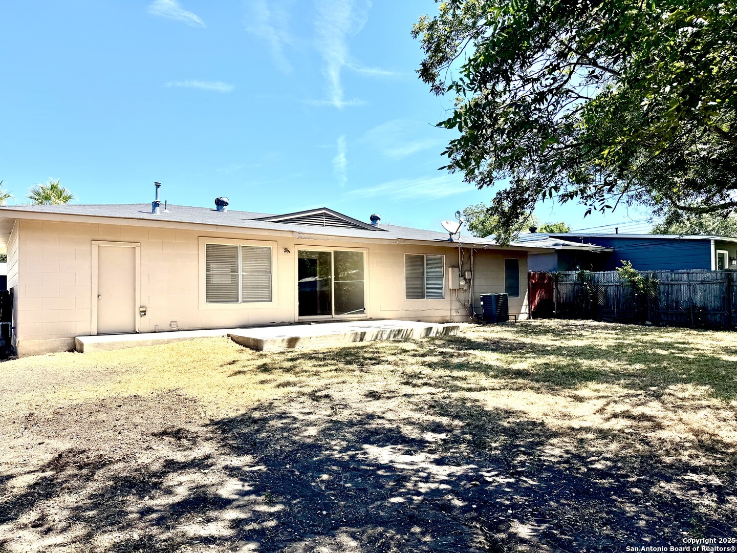 410 Shannon Lee Street San Antonio, TX 78216 - Photo 19 of 19 a front view of a house with a yard
