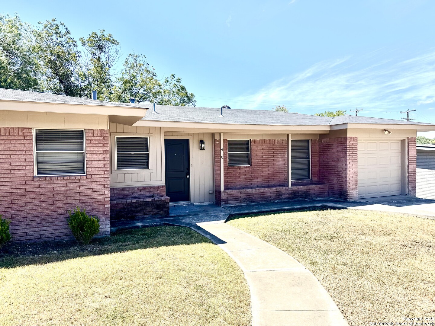 410 Shannon Lee Street San Antonio, TX 78216 - Photo 2 of 19 a view of a house with a patio