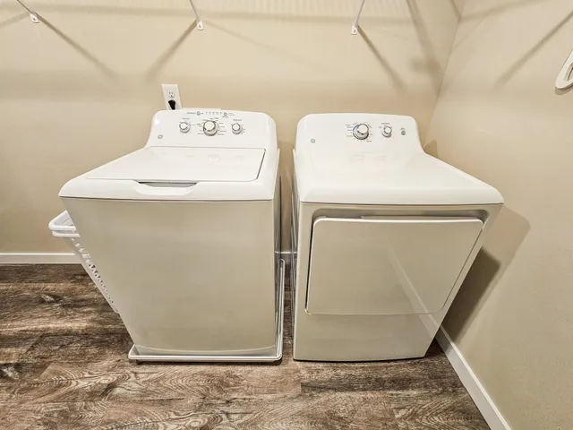 a utility room with dryer and washer