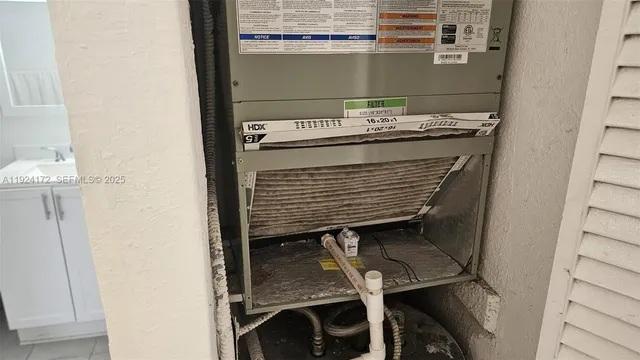 a view of a balcony with wooden floor and fence