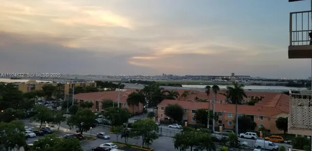 a view of a balcony with city view