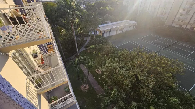 a view of a street with cars