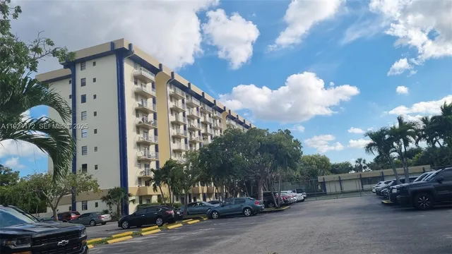 a hallway with a view of living room
