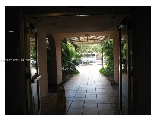 a view of a chairs and table on the deck