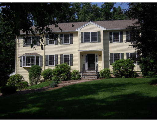 88 Slough Road Harvard, MA 01451 - Photo 1 of 1 a front view of a house with a yard