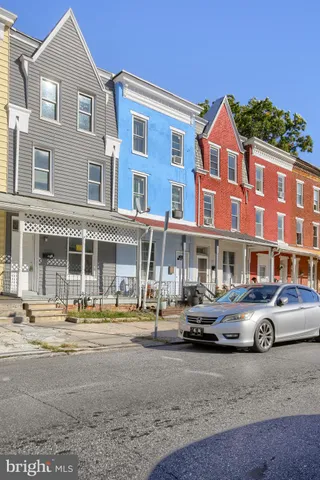 a front view of a building with street view