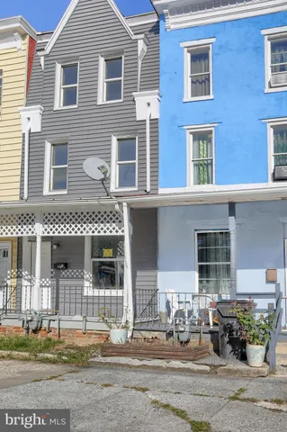 a front view of a building with street
