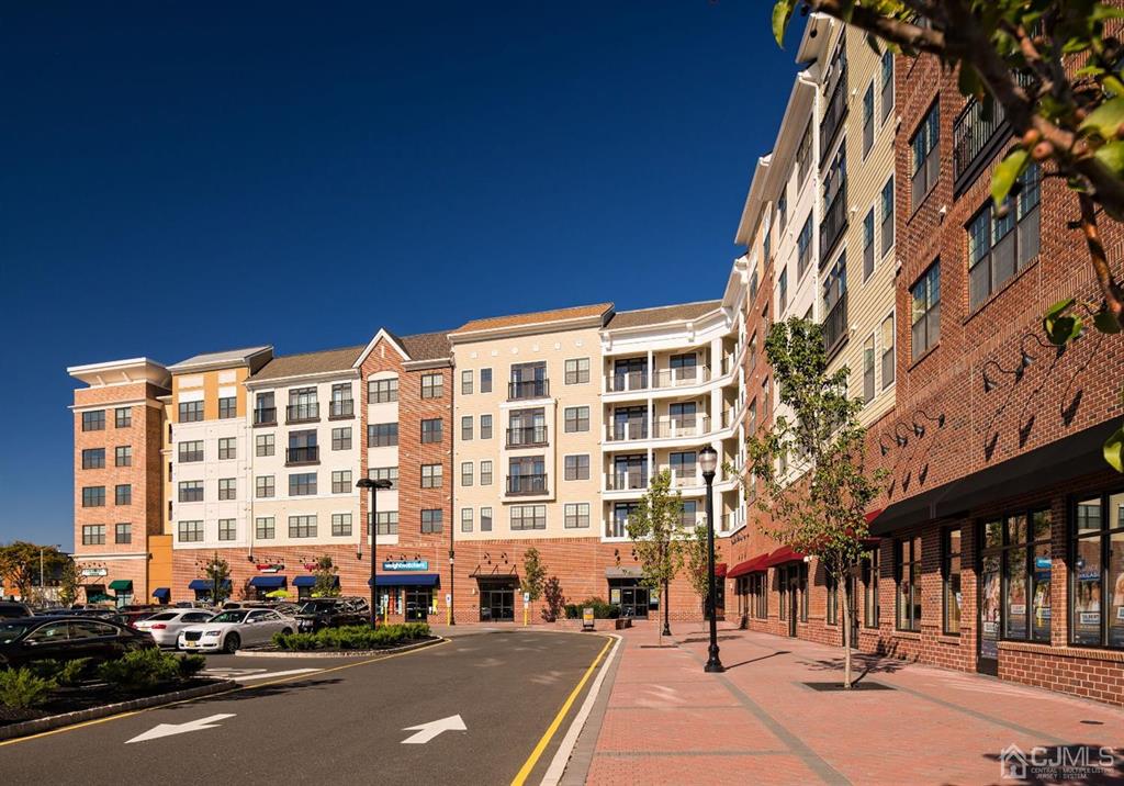 a view of a building with a street