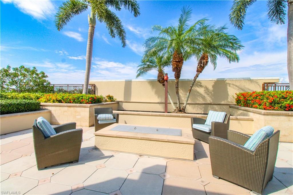 9123 Strada Place, Unit 7410 Naples, FL 34108 - Photo 10 of 50 View of patio / terrace featuring an outdoor living space