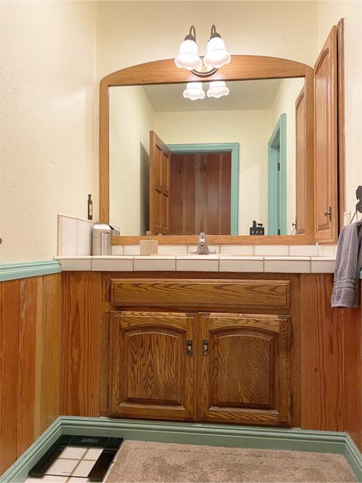 1800 Tucker Road Scotts Valley, CA 95066 - Photo 26 of 33 a bathroom with a sink and a mirror