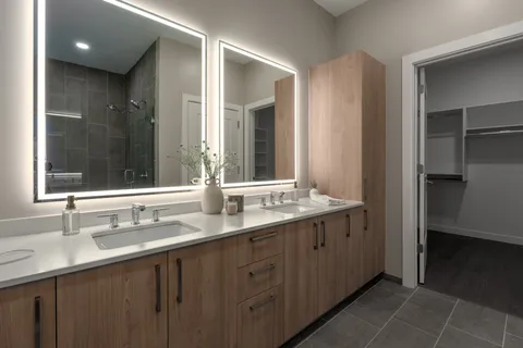 a bathroom with a bathtub and a shower