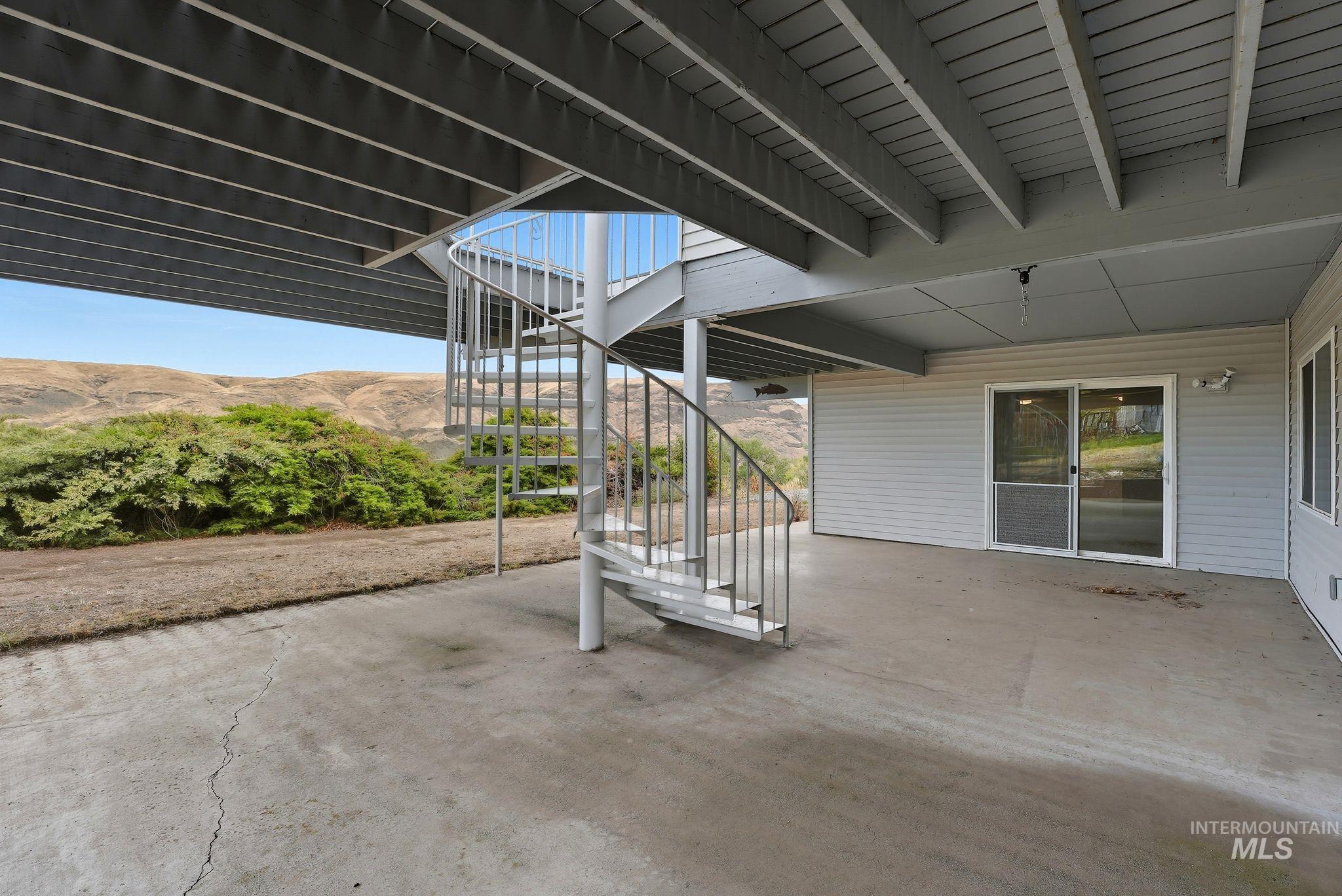 1101 5th Street Asotin, WA 99402 - Photo 41 of 48 View of patio featuring stairs and a mountain view