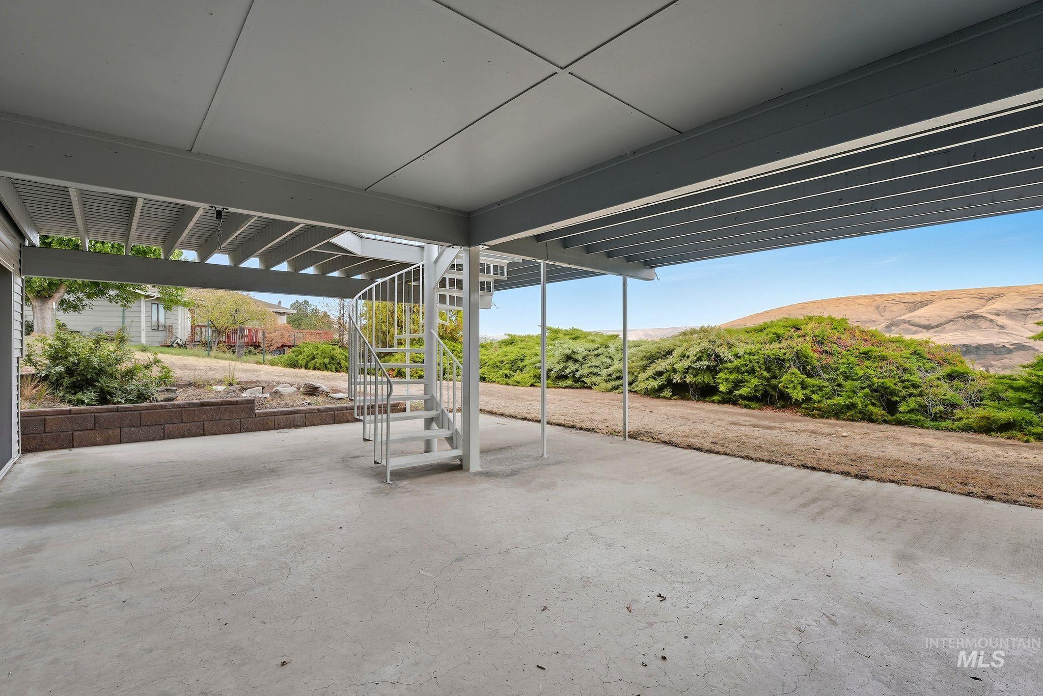1101 5th Street Asotin, WA 99402 - Photo 42 of 48 View of patio with stairway and a mountain view