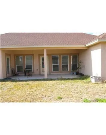 a view of a house with a swimming pool