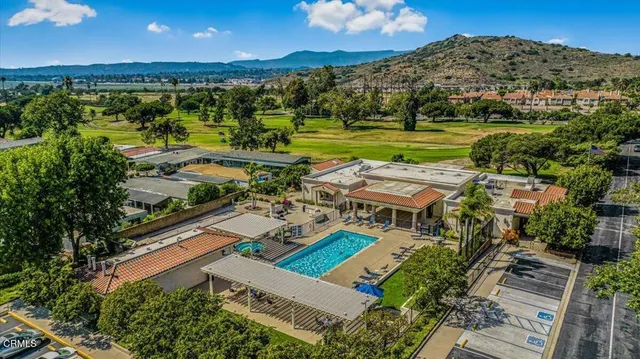 a view of a city with lawn chairs