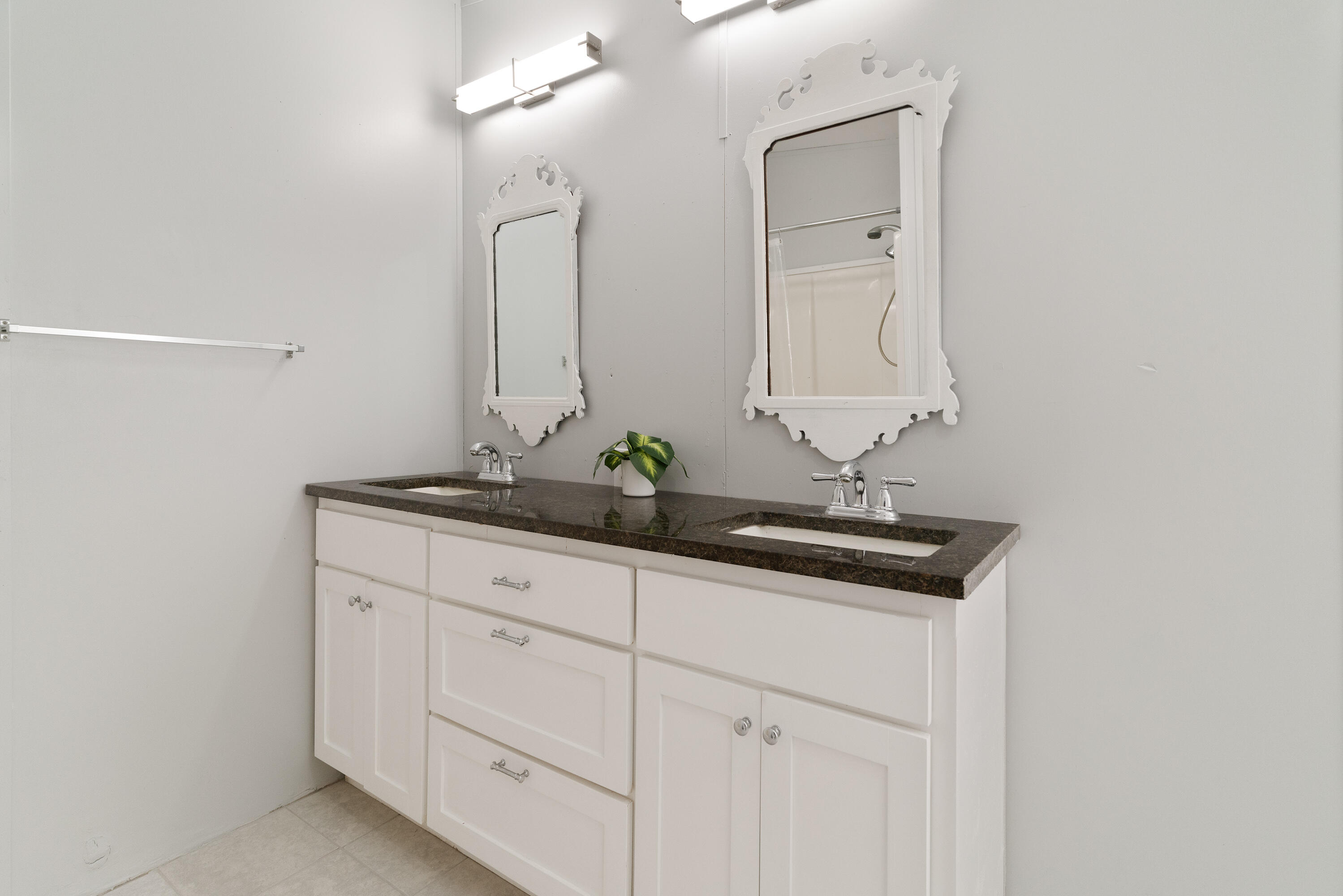 1032 Whitehead Drive Holt, FL 32564 - Photo 15 of 40 a bathroom with a sink and a mirror