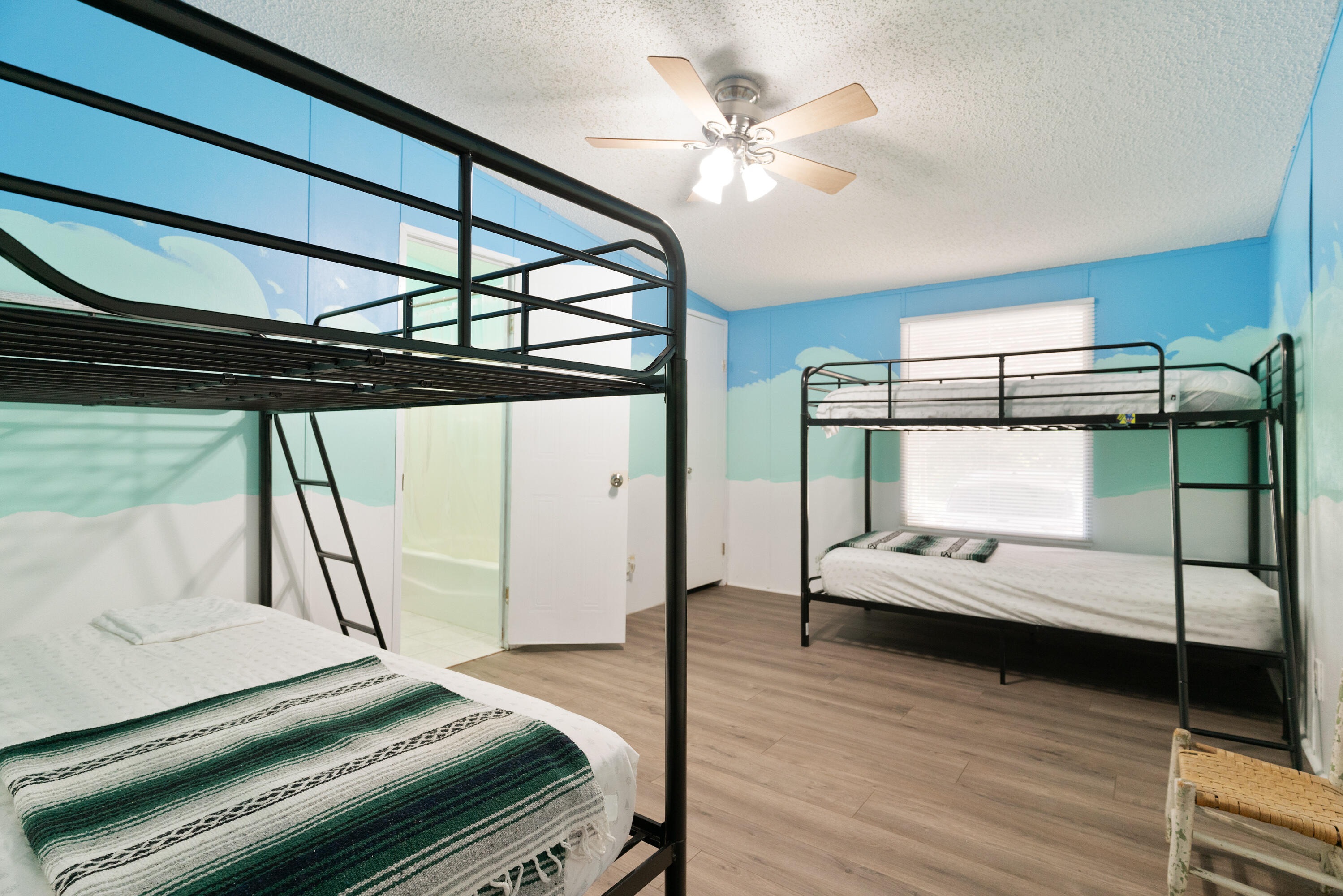 1032 Whitehead Drive Holt, FL 32564 - Photo 19 of 40 a bedroom with a bed and a window