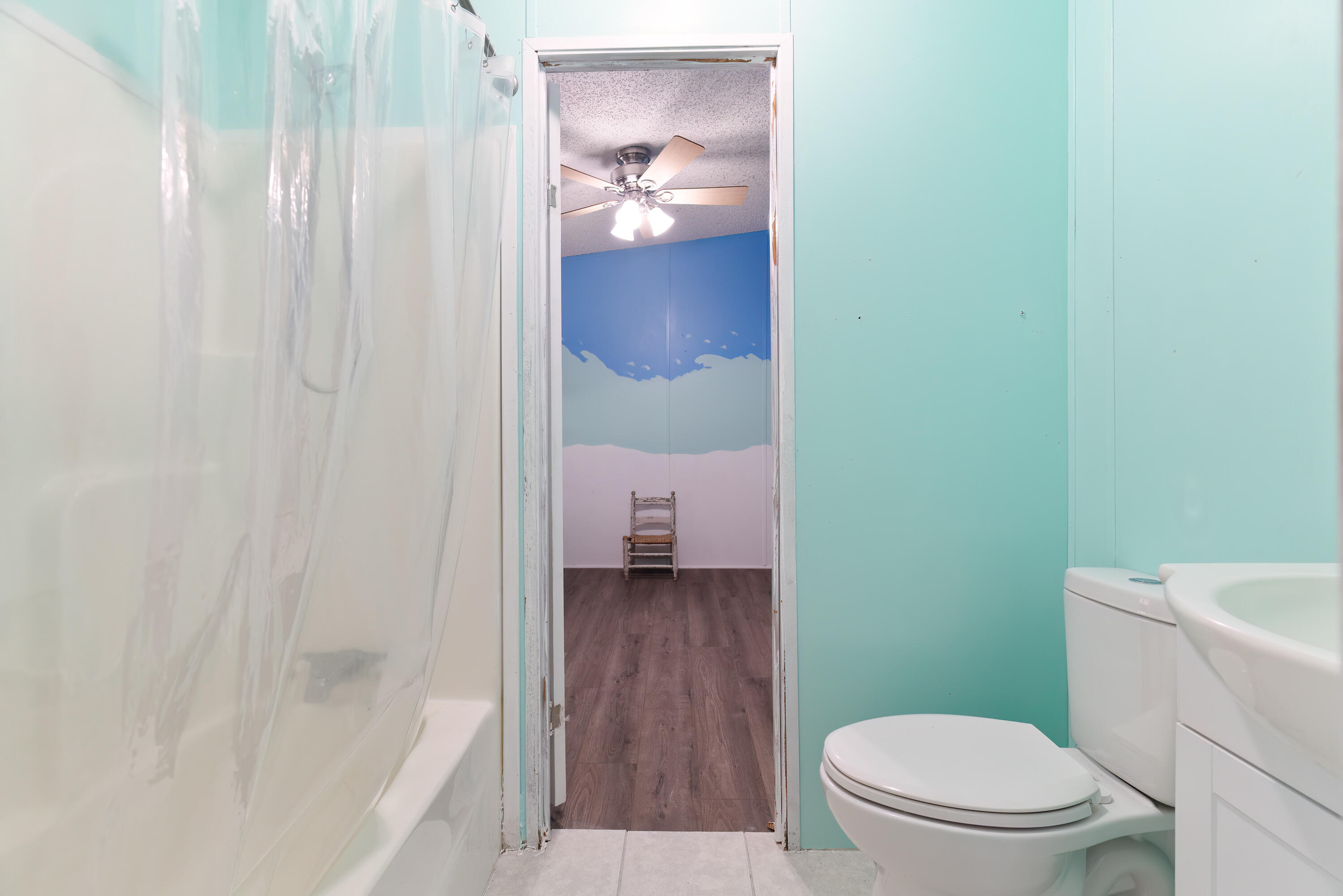 1032 Whitehead Drive Holt, FL 32564 - Photo 20 of 40 a bathroom with a toilet and a shower